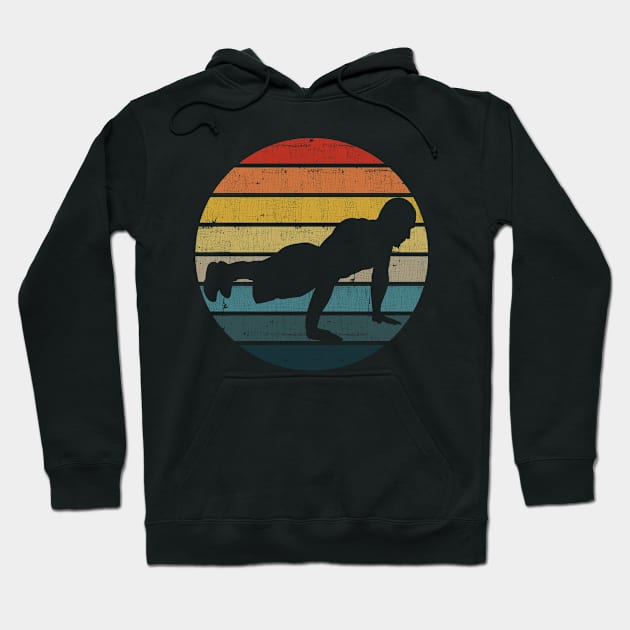 Push-Ups Silhouette On A Distressed Retro Sunset graphic Hoodie by theodoros20